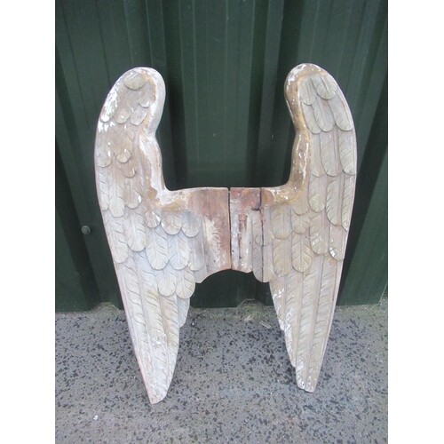 Pair of carved wood angel wings with traces of gilt and poly...