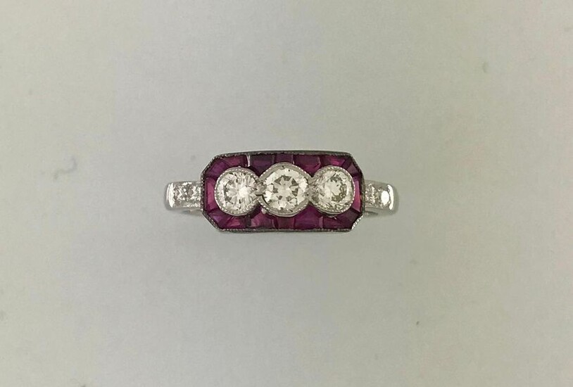 Ring in white gold 750°/°°°sertie of 3 diamonds set with calibrated rubies, Finger size 53, Gross weight: 4g