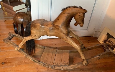 Rocking horse in natural wood, mane and tail...