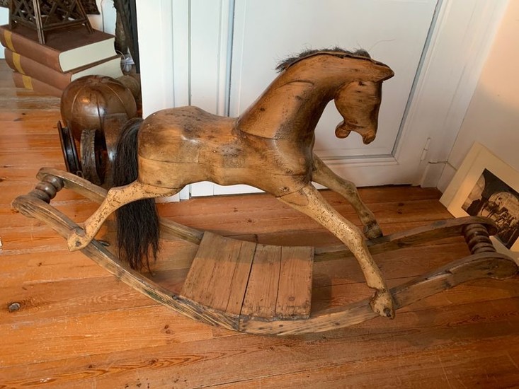 Rocking horse in natural wood, mane and tail...