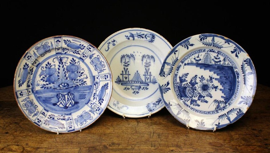 Three 18th Century Blue & White Delft Plates, approximately 12'' (30 cm) in diameter.