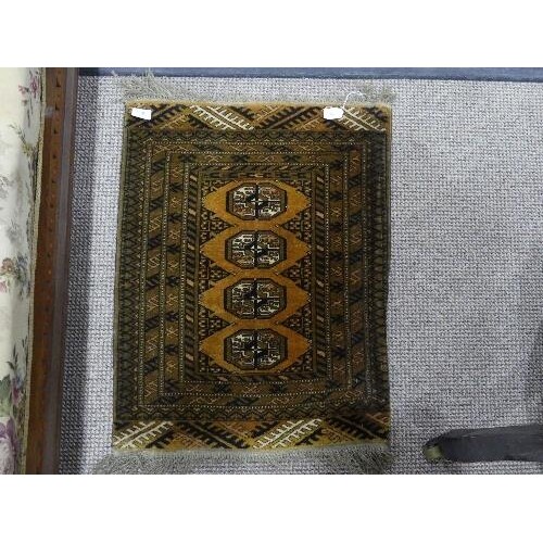 Tribal Rugs; a brown and plum ground prayer rug, 32in x 58in...