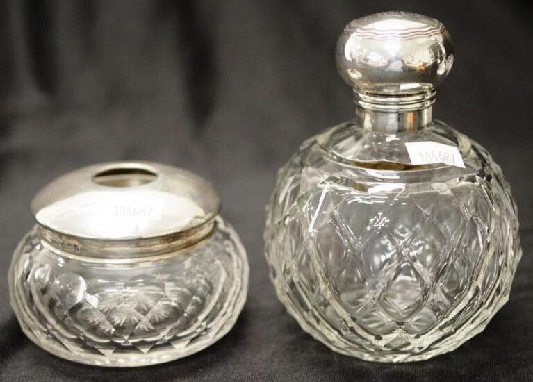Two George V silver lidded crystal bottles lidded bowl,...