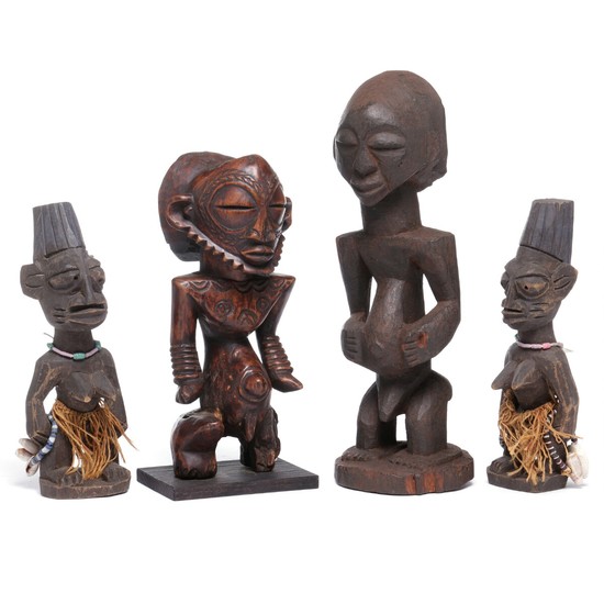 Two ancestor figures and a pair of Ibeji twins of carved patinated wood. Luba and Yoruba style. H. 26–38 cm. (4)