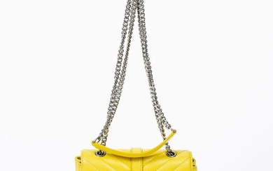 SOLD. Yves Saint Laurent: A bag made of yellow Chevron leather with silver toned hardware, chain strap and one exterior back pocket. – Bruun Rasmussen Auctioneers of Fine Art