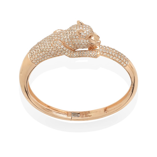 an 18k rose gold and diamond panther bangle
