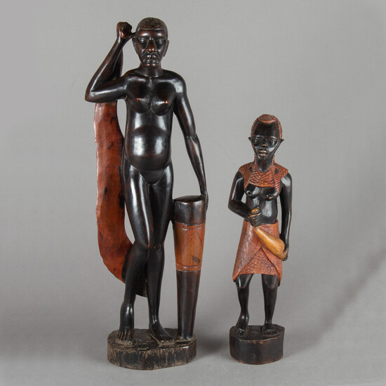 2 African wooden figures. Masai women. 20th Century.