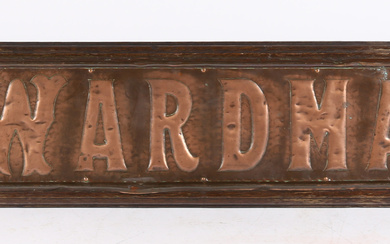 AN EARLY 20TH CENTURY ARTS AND CRAFTS CHEMIST SHOP TRADE SIGN.