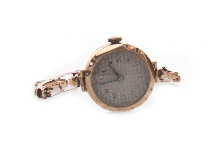 A LADY'S GOLD MANUAL WIND WATCH
