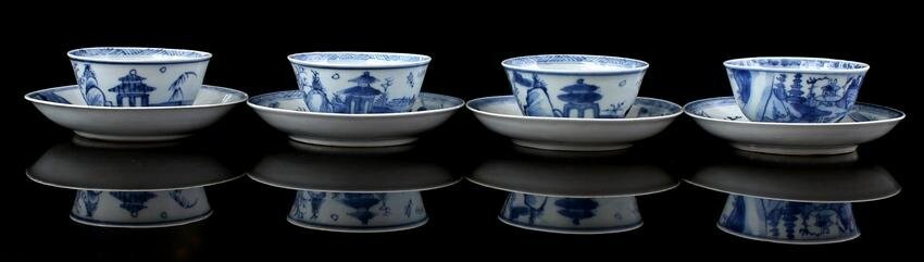 4 porcelain cups and saucers with blue and white decor