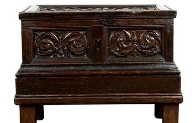 A continental carved chest on stand circa 1700
