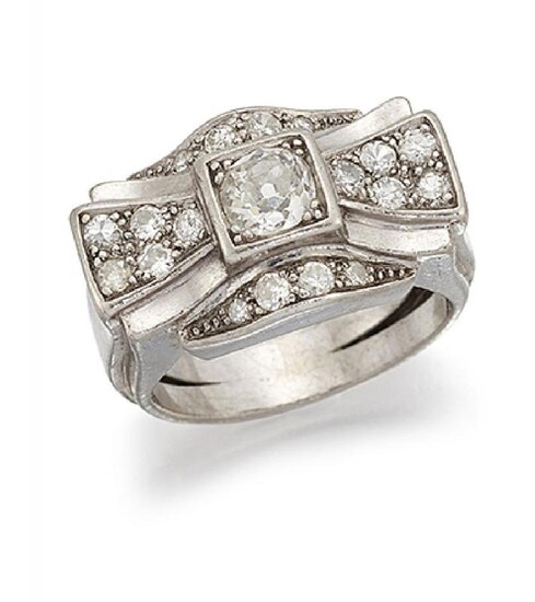A 1940's diamond cluster ring, designed as...