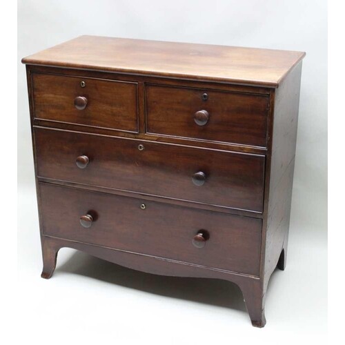 A 19TH CENTURY MAHOGANY FOUR DRAWER CHEST on plain splayed l...