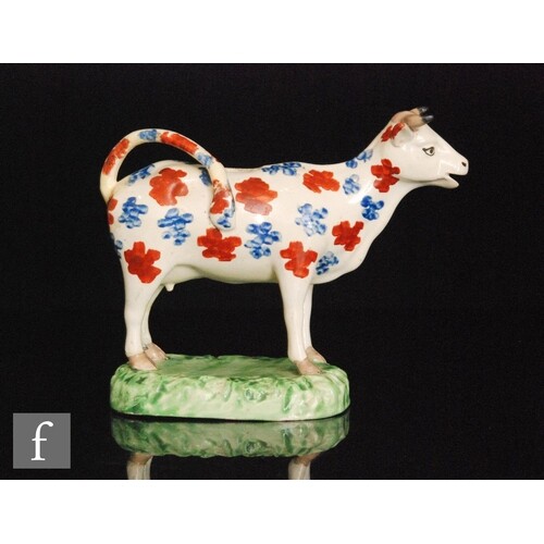 A 19th Century Welsh cow creamer, possibly Cambrian, with bu...