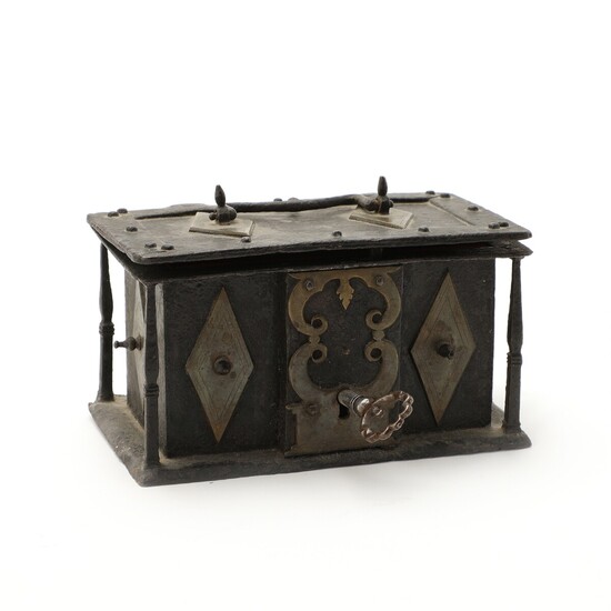 A 19th century Baroque style iron and brass box. H. 8 cm L. 15 cm D. 9 cm.