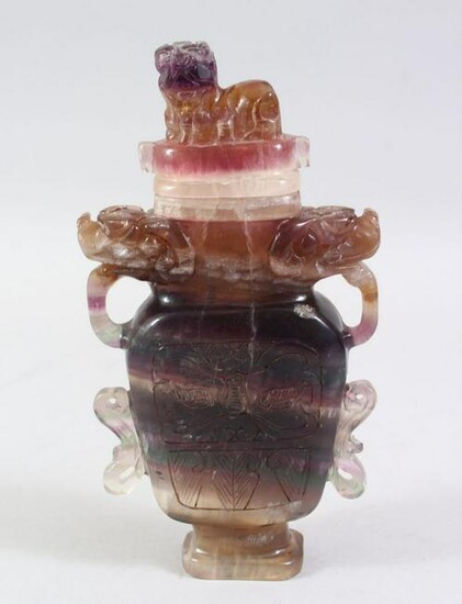 A 20TH CENTURY CHINESE CARVED AMETHYST VASE AND COVER