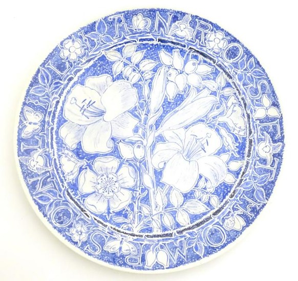A 20thC blue and white hand painted plate decorated