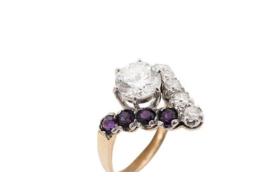 A 9ct gold diamond and amethyst ring