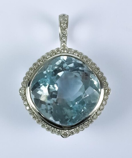 A Blue Topaz and Diamond Pendant, Modern, 18ct white...