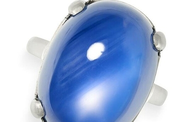 A CABOCHON STAR SAPPHIRE RING in platinum, set with an oval cabochon star sapphire of 40.83 carats