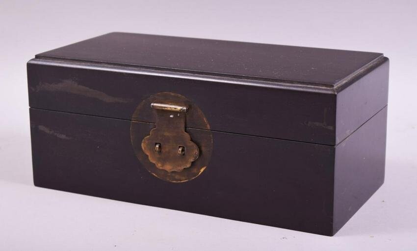 A CHINESE RECTANGULAR HINGED LIDDED WOODEN BOX, with