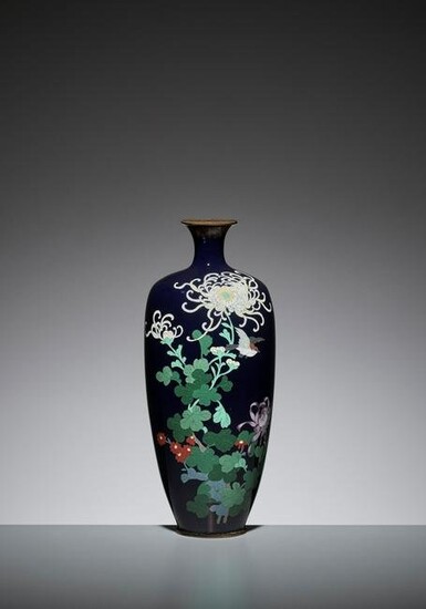A CLOISONNE ENAMEL VASE WITH A BIRD AND FLOWERS