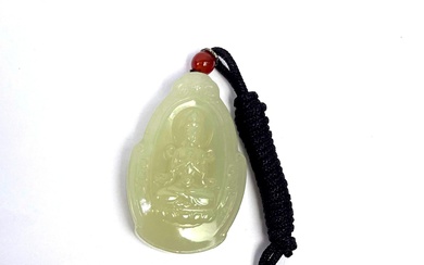 A Chinese Carved Jade Pendant Depicting Guanyin