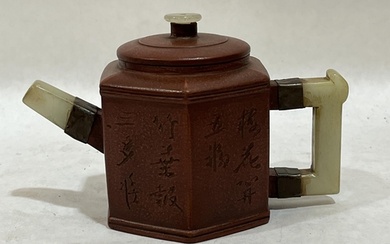 A Chinese Yixing Zisha clay teapot with hardstone handle and...