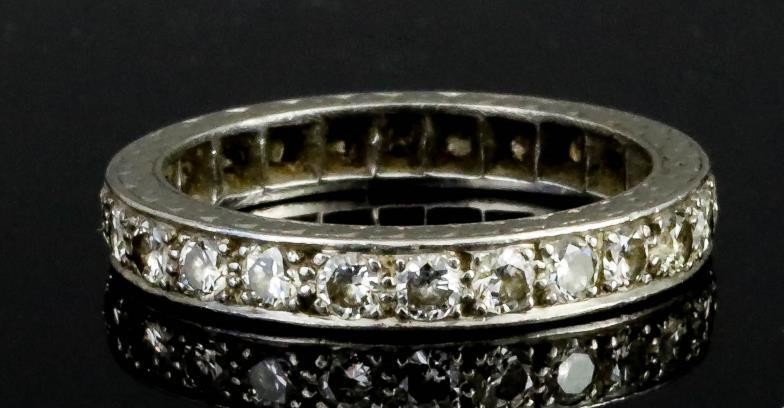 A Diamond Full Hoop Eternity Ring, Modern, in silvery...