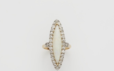 A French Belle Epoque 18k gold diamond and milky opal Marquise ring.