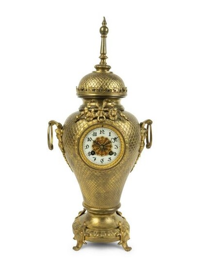 A French Gilt Bronze Urn-Form Clock Height 21 x width 9