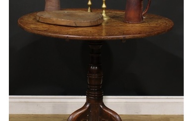 A George III oak tripod occasional table, circular tilting t...