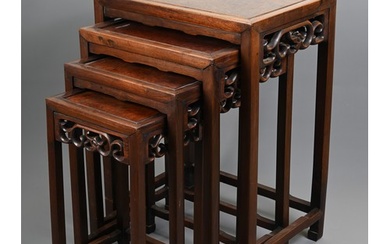 A NEST OF FOUR CHINESE ROSEWOOD AND BURR WALNUT TABLES, EARL...