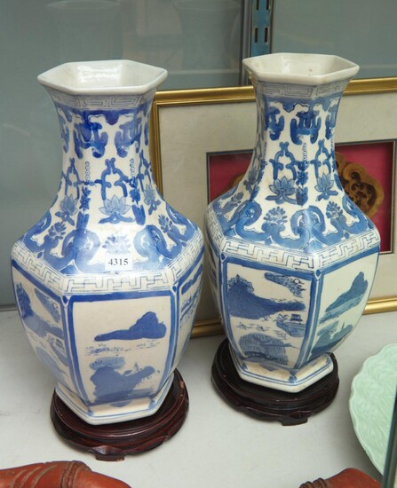 A PAIR OF HEXAGONAL CHINESE BLUE AND WHITE PORCELAIN VASES WITH STANDS