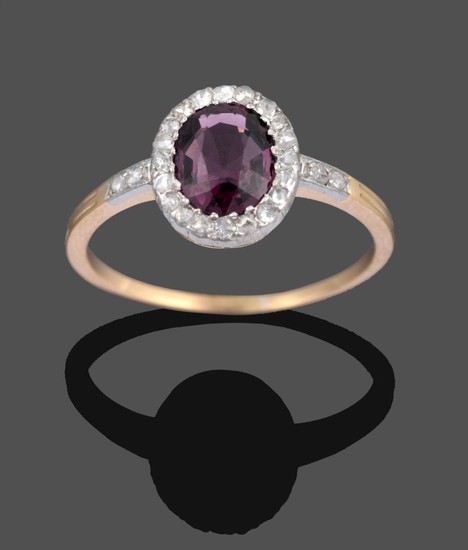 A Spinel and Diamond Cluster Ring, the oval mixed cut...