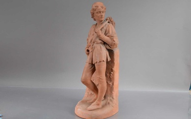 A Victorian Watcombe Pottery moulded terracotta statue of the young "Dick Whittington"