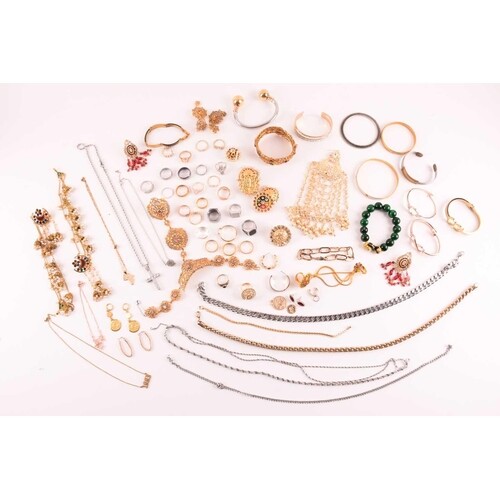 A bag of assorted base metal costume jewellery, including va...