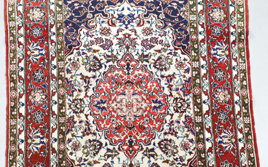 A carpet, probably Isfahan, semi-antique, dimensions 159x100 cm.
