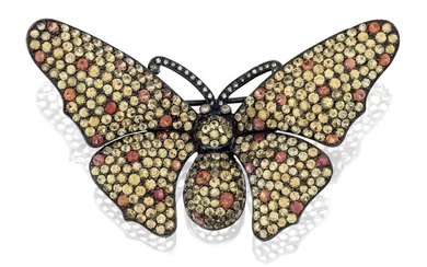 A coloured sapphire butterfly brooch, with vari-toned pave-set yellow sapphire wings, and orange sapphire circular-cut detail, in oxidised mount, approx. width 7cm