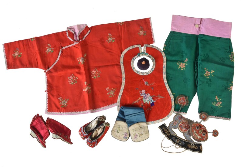 A group of Chinese child's clothes and shoes