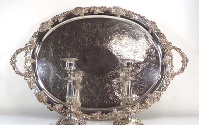 A large silver plated two handled tray of oval form...