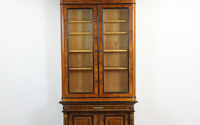 A late 19th century mahogany and walnut bookcase.