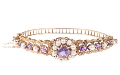 A late 20th century 9ct gold amethyst and pearl cluster hing...