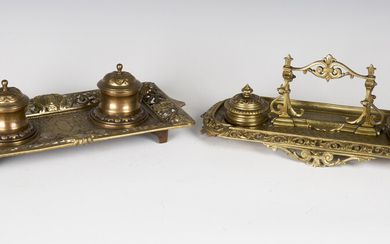 A late Victorian Baroque Revival cast brass inkstand, width 35cm, together with another similar inks