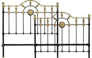 A late Victorian brass and iron double bedstead.