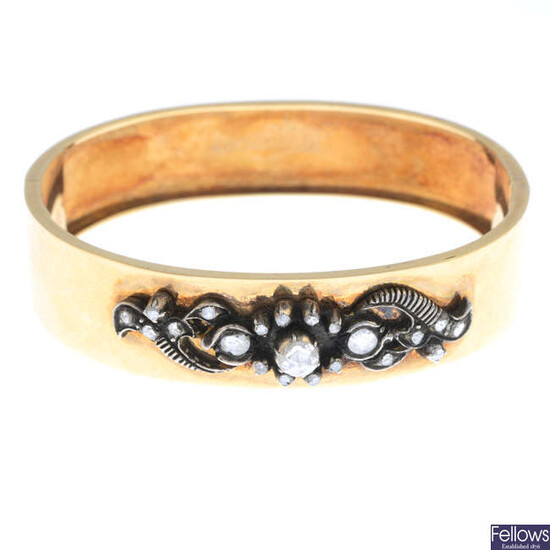 A mid to late 19th century 14ct gold rose-cut diamond hinged bangle.