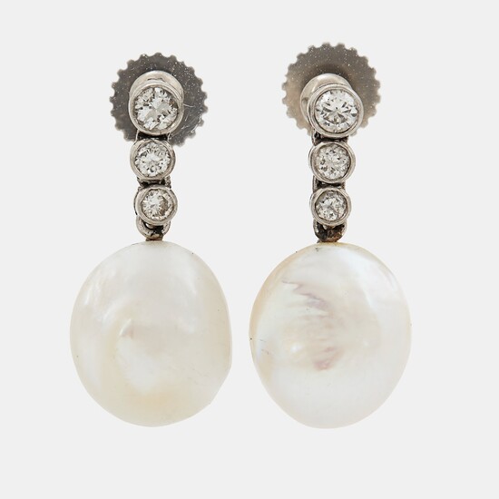 A pair of 18K white gold earrings set with pearls and round brilliant-cut diamonds