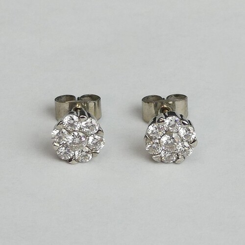 A pair of 18ct white gold diamond cluster earrings, 2.3 gram...