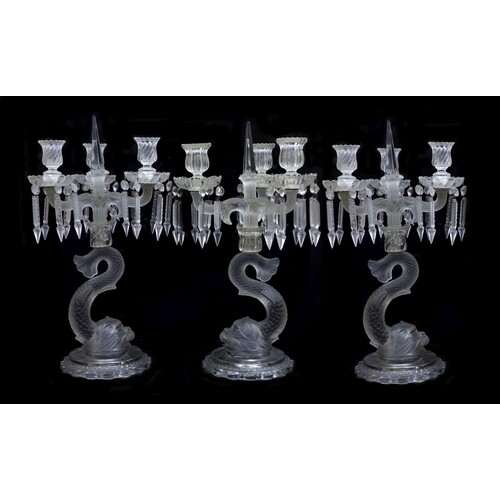 A pair of Baccarat moulded and frosted glass candelabra and ...