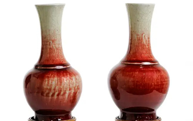 A pair of Chinese copper-red-glazed bottle vases Qing dynasty, 18th/19th century Each...